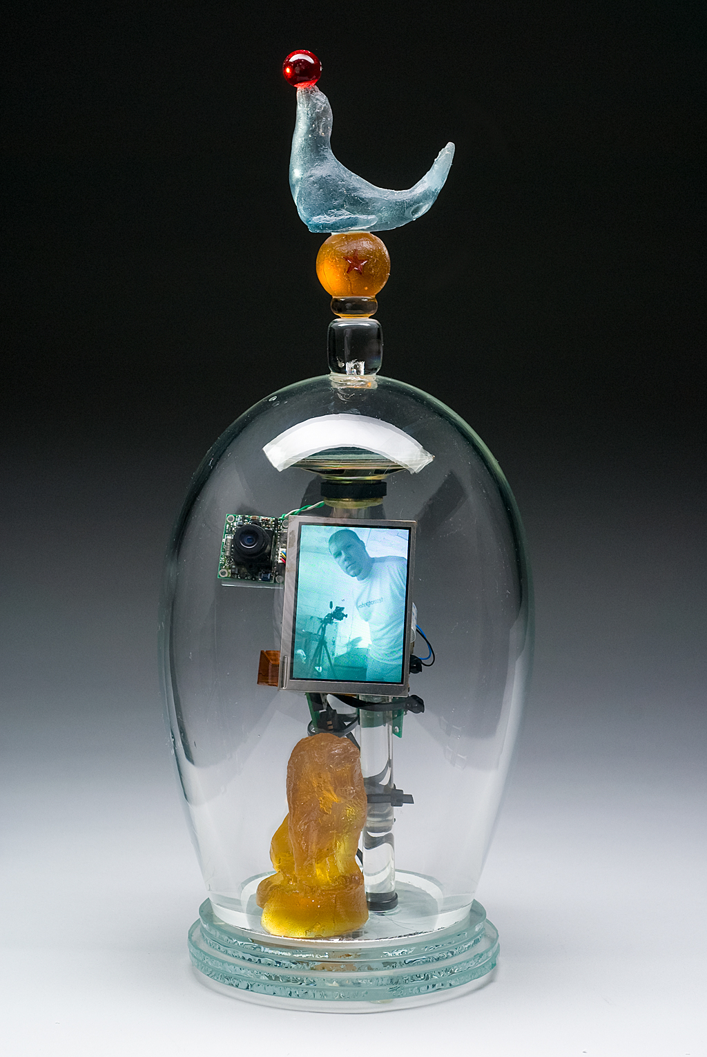 I Want To Run Away and Join the Circus, 2009: Tim Tate. Blown and cast glass, electronic components, original video. Photo: Anything Photographic