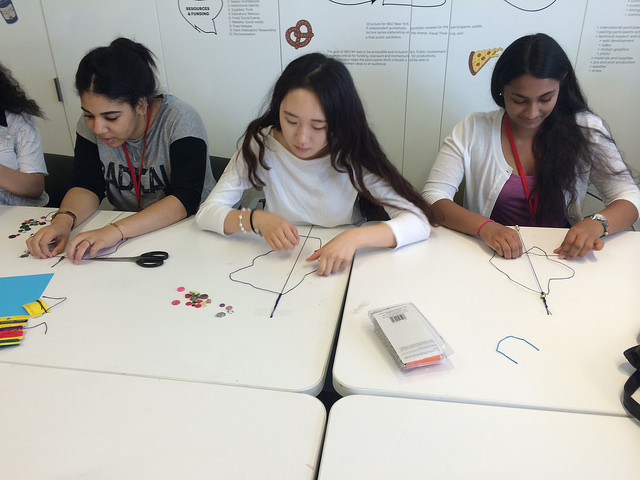 students making jewelry: students making jewelry